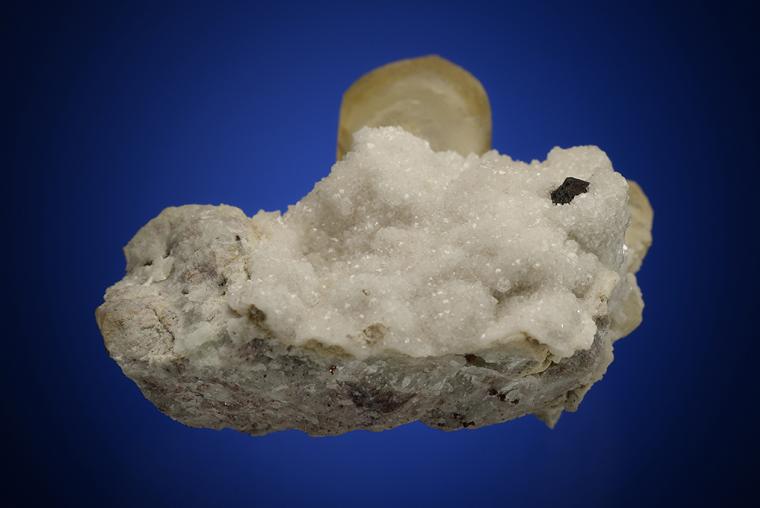 CALCITE with COPPER on ANALCIME
